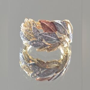 Elegant Gold and Silver Leaf Ring